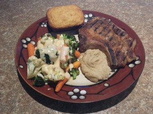 Smoked Pork Chops, Savory Apple Sauce, Roast Vegetables with Smoked Gouda Cheese Sauce and Cornbread Muffins
